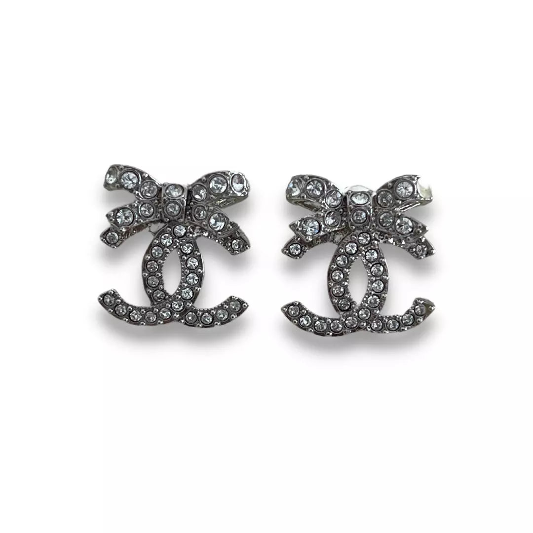 CHANEL SILVER CC CRYSTAL & RIBBONS EARRINGS