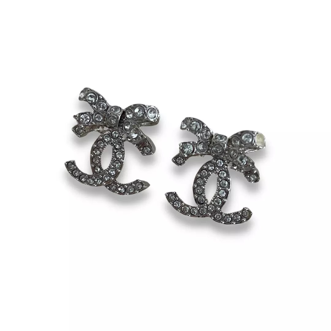 CHANEL SILVER CC CRYSTAL & RIBBONS EARRINGS