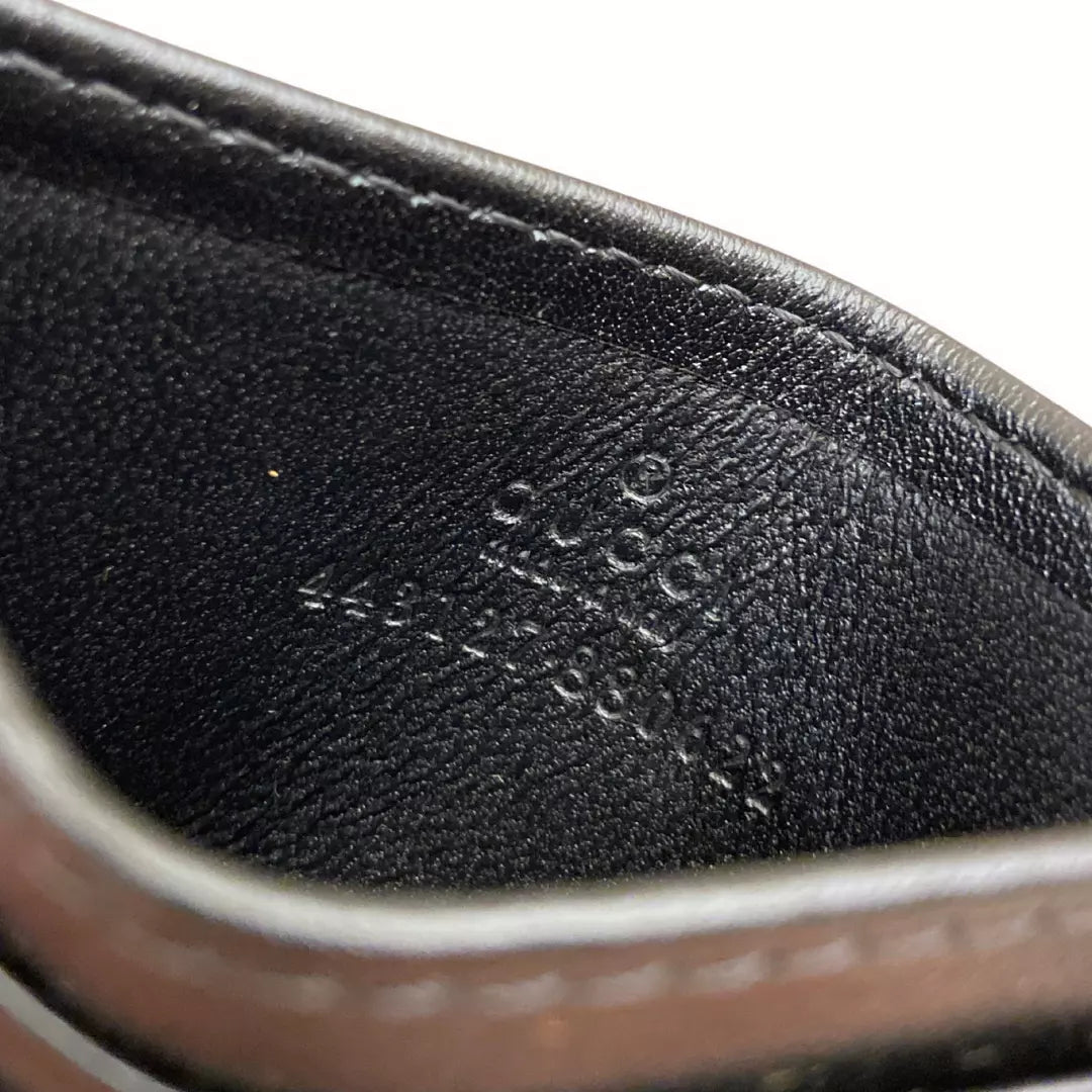 Tarjetero Gucci GG Marmont de piel negra