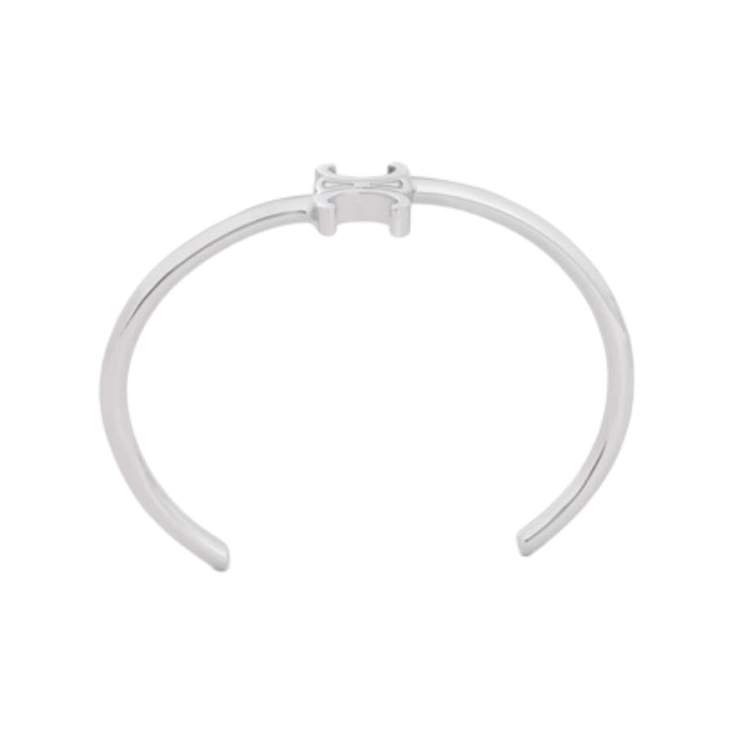 CELINE TRIOMPHE ASYMMETRIC CUFF IN BRASS WITH RHODIUM FINISH