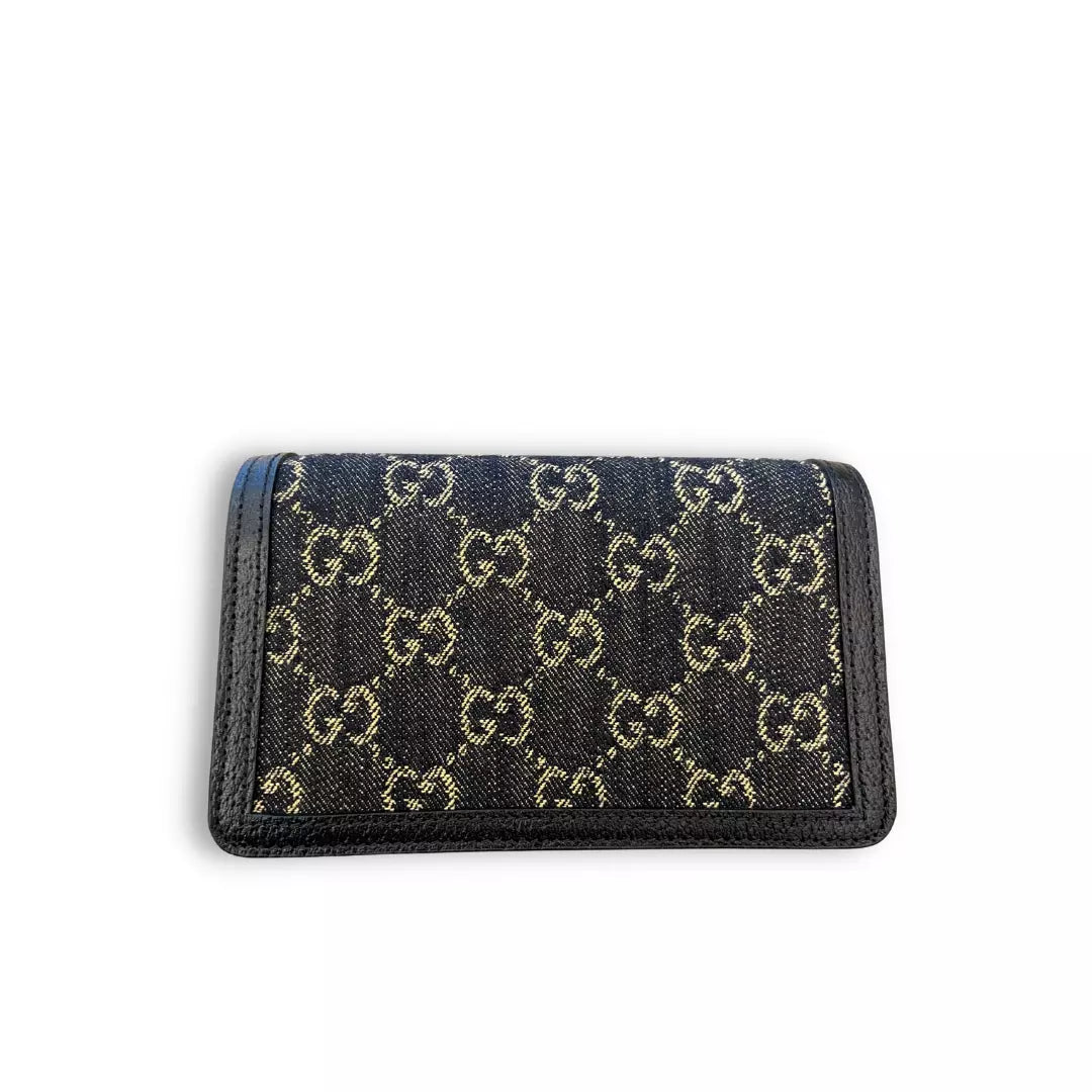 BOLSO MINI DIONYSUS GG SUPREME DE GUCCI EN VAQUERO Y CUERO NEGRO