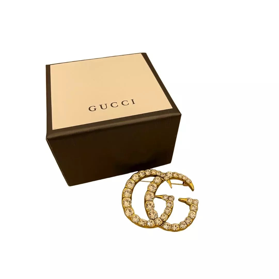 GUCCI GOLD METAL AND CRYSTALS DOUBLE G BROOCH