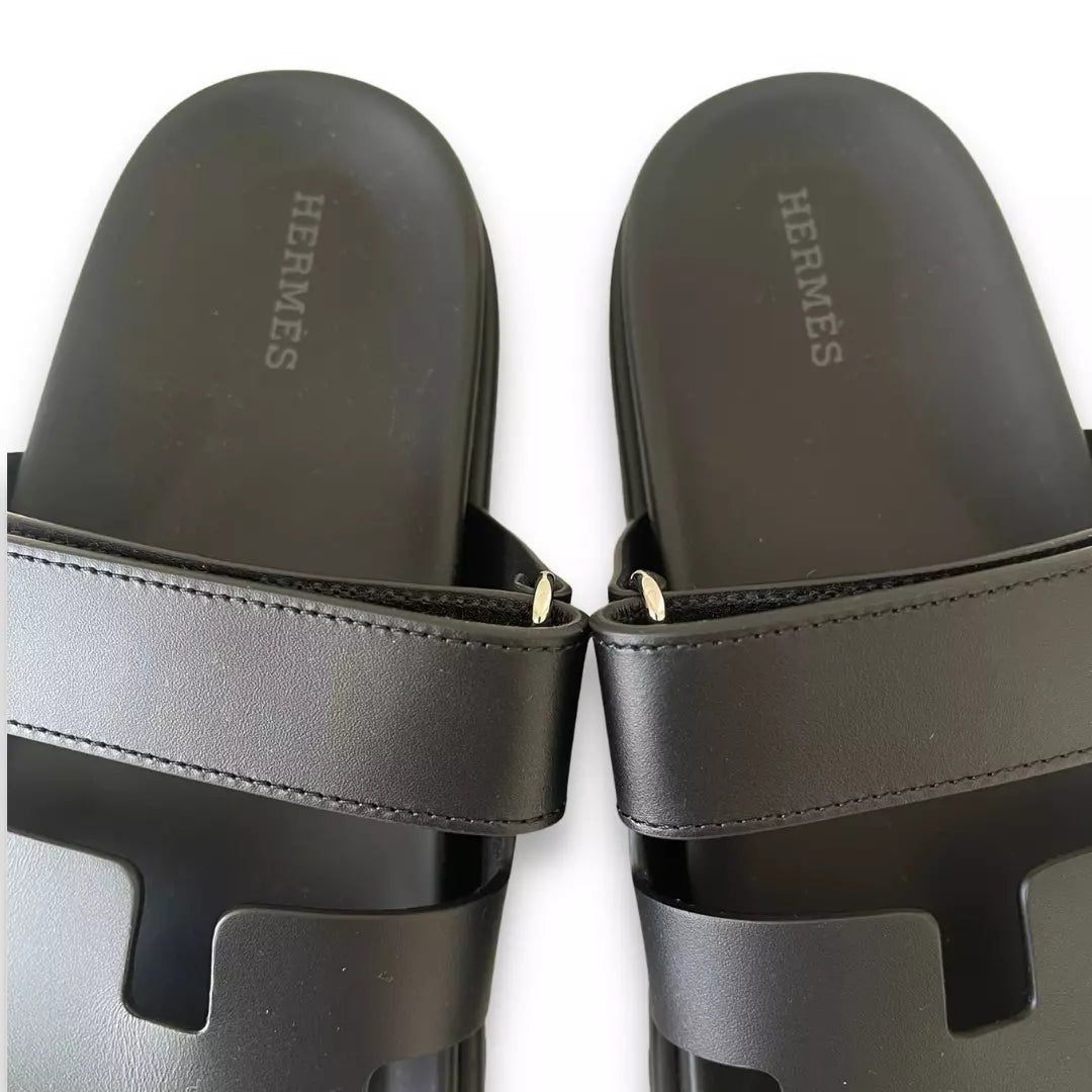 HERMÈS BLACK LEATHER CHYPRE SANDALS