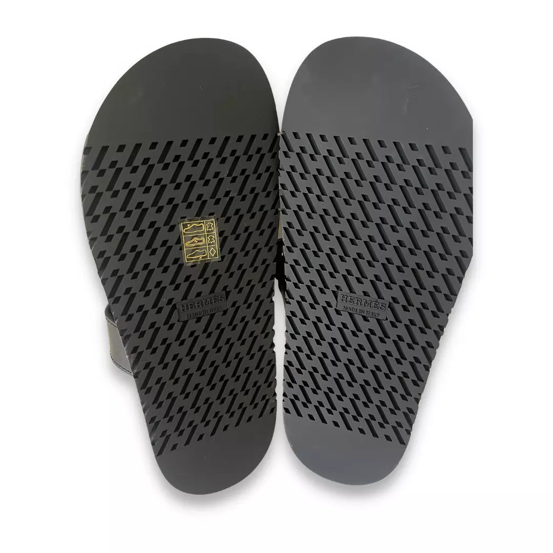 HERMÈS BLACK LEATHER CHYPRE SANDALS