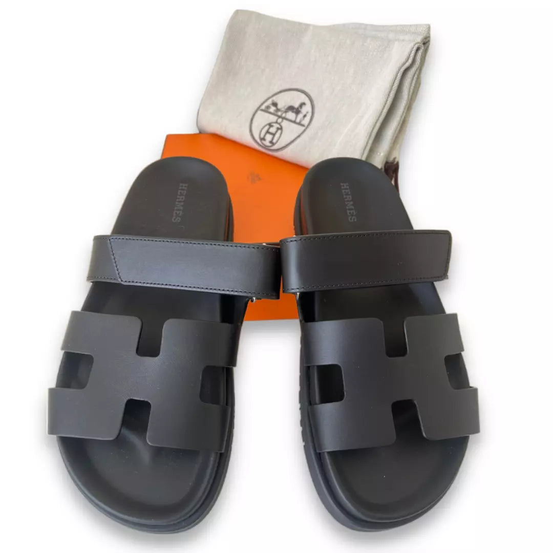 HERMÈS BLACK LEATHER CHYPRE SANDALS