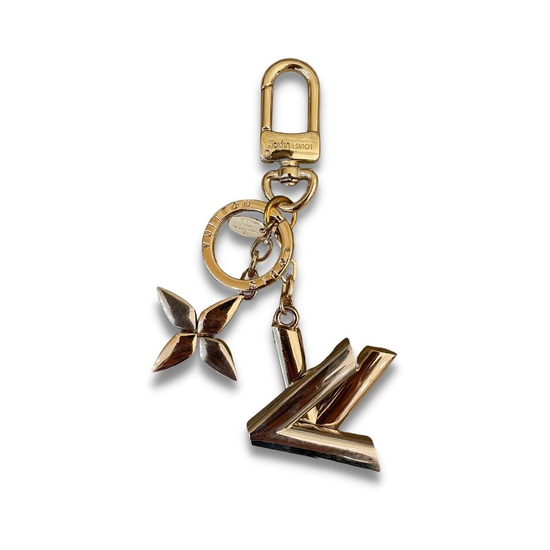 LOUIS VUITTON SILVER AND GOLD METAL TWIST BAG CHARM KEY HOLDER