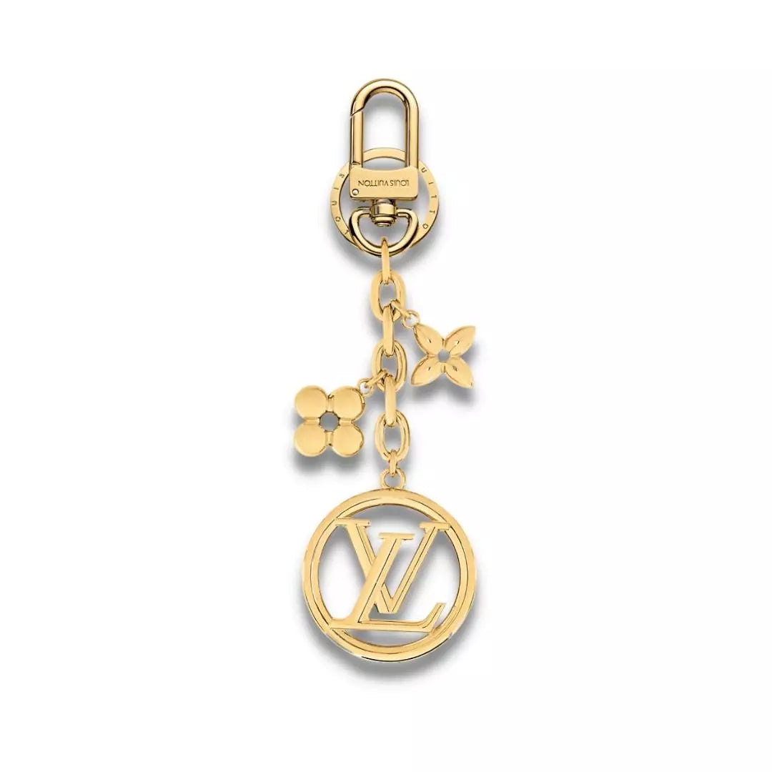 Charm para bolso y llavero con diseño floral de metal con acabado dorado de Louis Vuitton