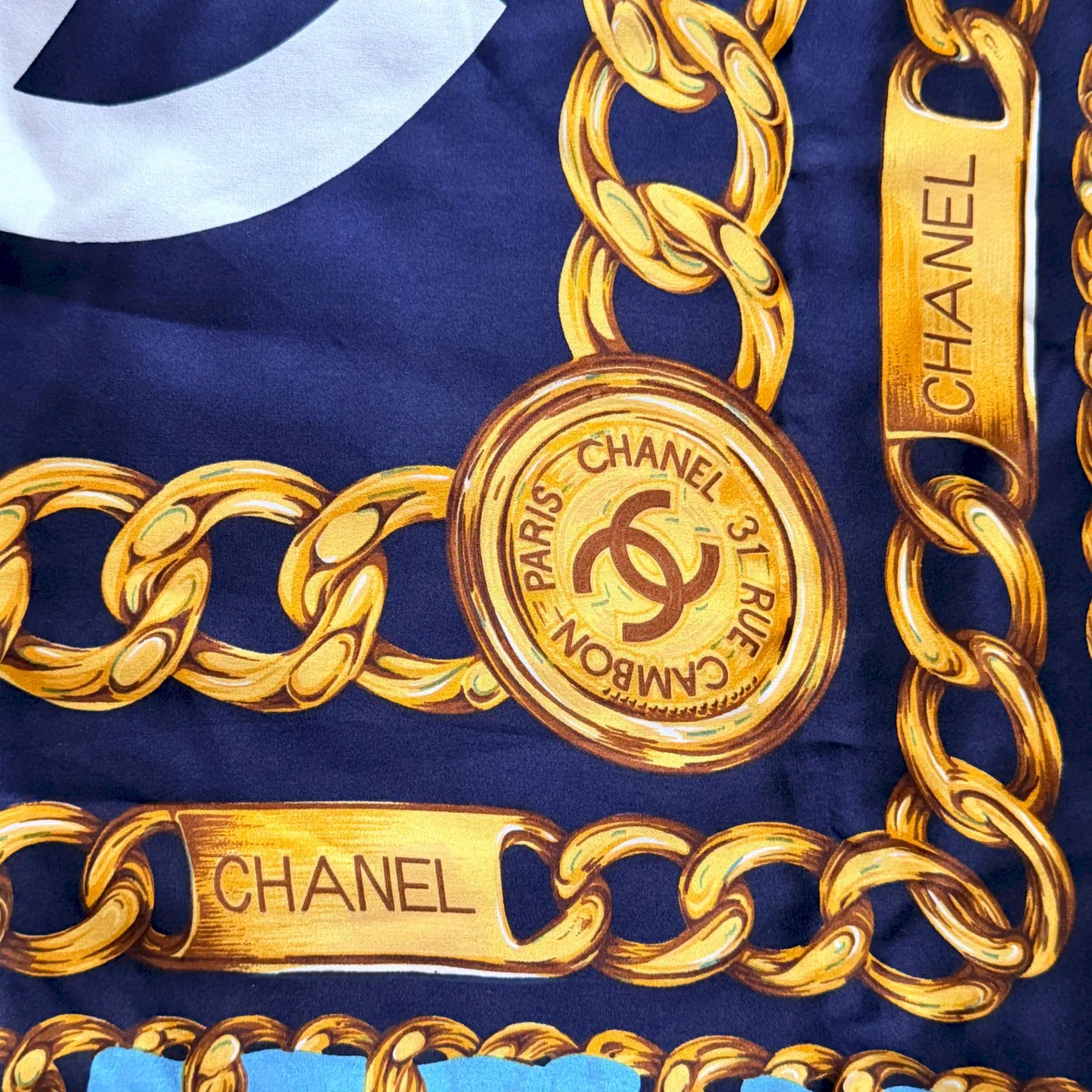 CHANEL NAVY SILK SCARF WITH GOLD CHAIN PRINT