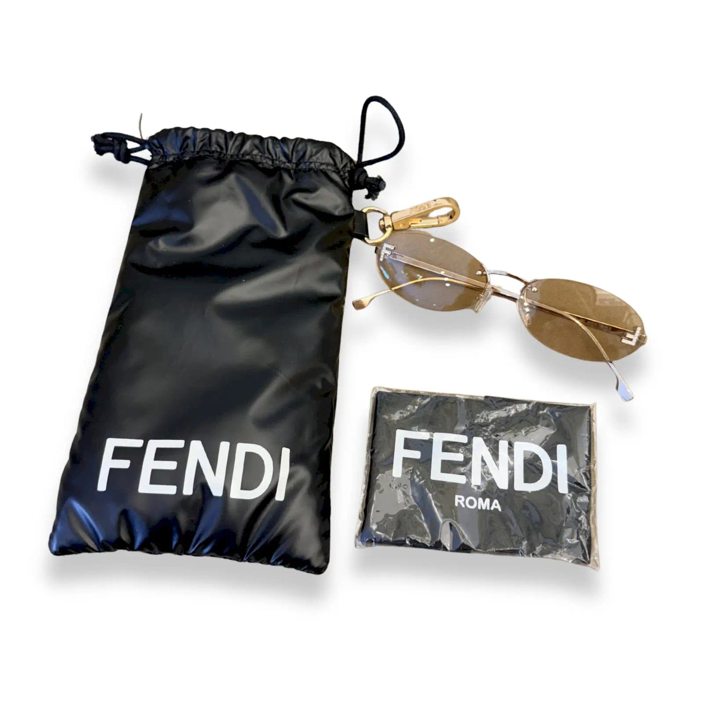 FENDI RIMLESS OVAL SUNGLASSES GOLD FRAME BROWN LENSES