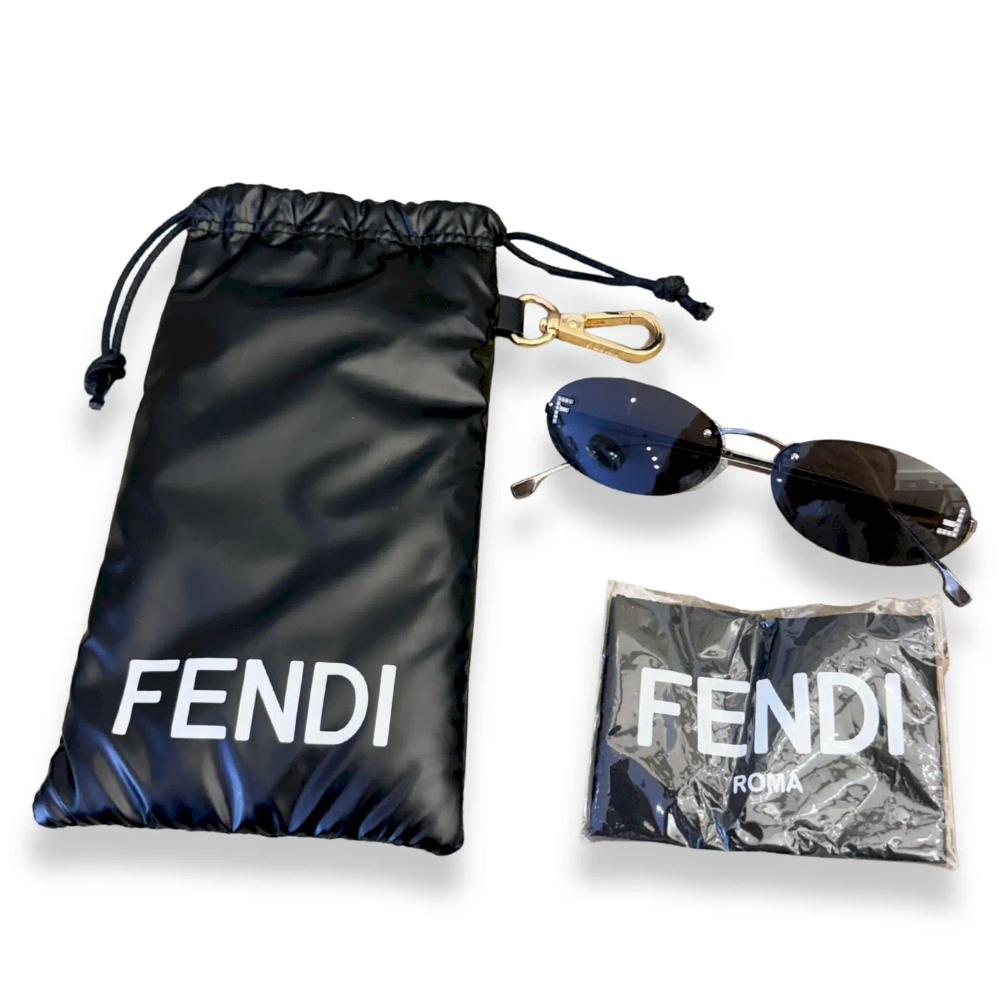 FENDI RIMLESS OVAL SUNGLASSES SILVER FRAME BLACK LENSES