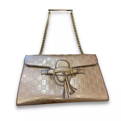 BOLSO METÁLICO CON MONOGRAMA ROSA DE GUCCI