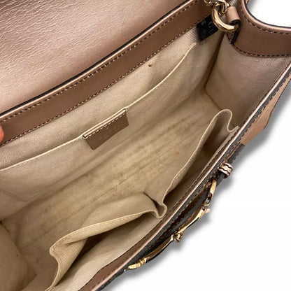 BOLSO METÁLICO CON MONOGRAMA ROSA DE GUCCI