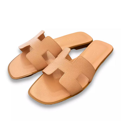 Sandalias Hermès color rosa claro y naranja 