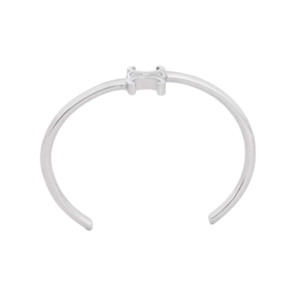 Brazalete asimétrico CELINE TRIOMPHE de latón con acabado en rodio