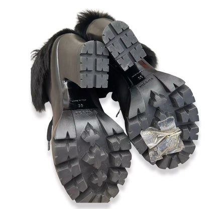 Botines Prada de piel y cuero negro