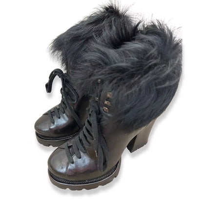 Botines Prada de piel y cuero negro