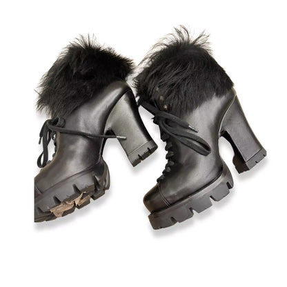 Botines Prada de piel y cuero negro