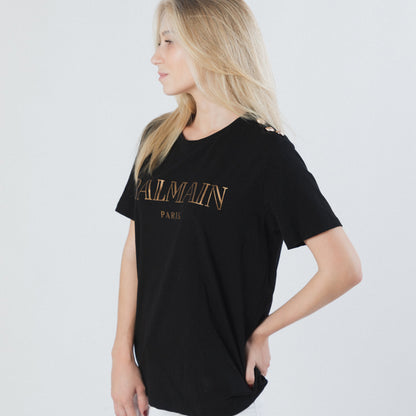 CAMISETA CON BOTONES Y LOGO NEGRO DE BALMAIN