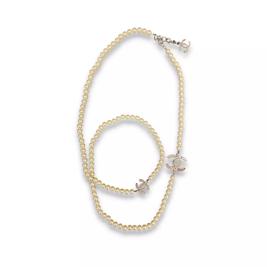 CHANEL LONG PEARLS CC NECKLACE