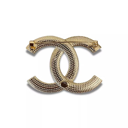 BROCHE DE CRISTAL DE PERLA CC DE CHANEL