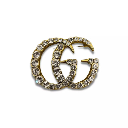 GUCCI GOLD METAL AND CRYSTALS DOUBLE G BROOCH