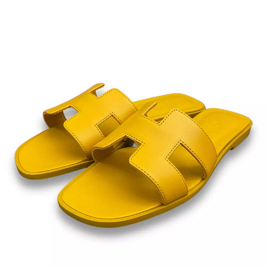 HERMÈS JAUNE TOPAZE ORAN SANDALS