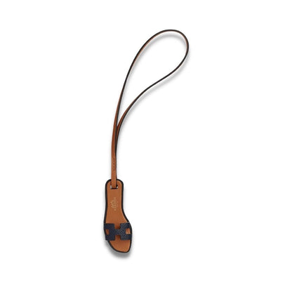 CHARM NANO NEGRO NARANJA DE HERMÈS 
