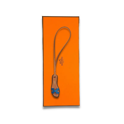 CHARM NANO AZUL NARANJA DE HERMÈS