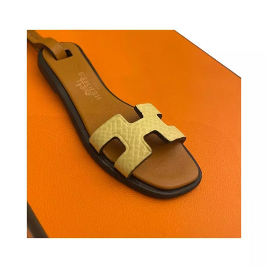 CHARM NANO AMARILLO NARANJA DE HERMÈS 