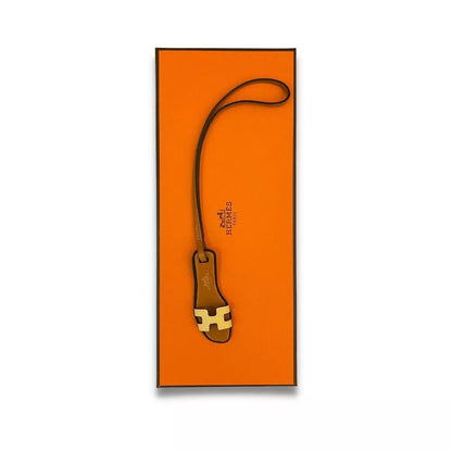 CHARM NANO AMARILLO NARANJA DE HERMÈS 