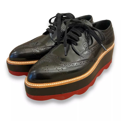 DERBIES NEGROS Prada